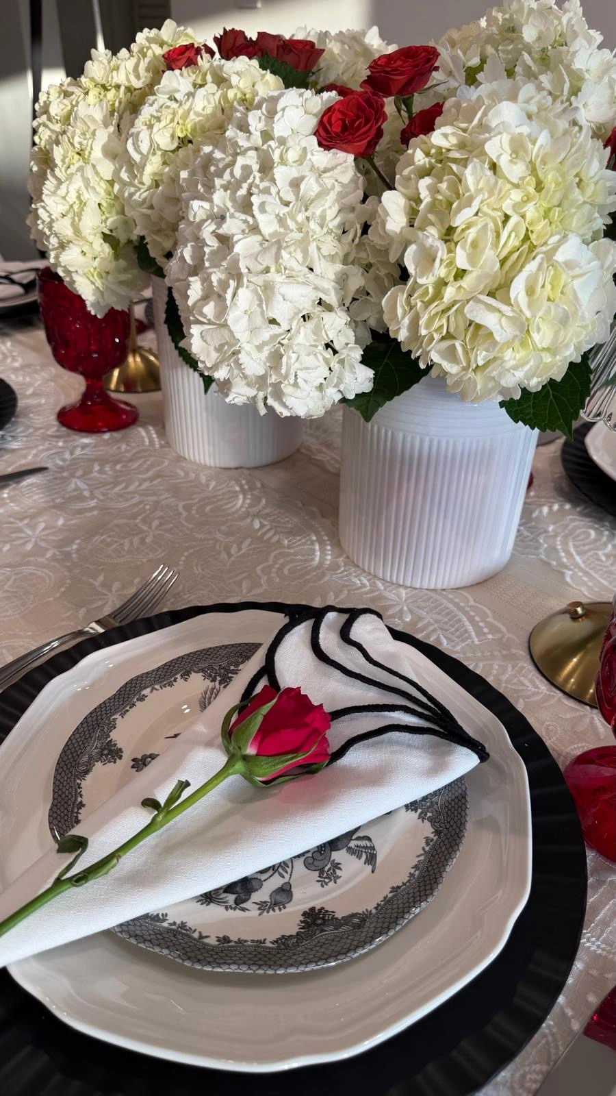 White and red Maison Lucia table styling with refined floral details